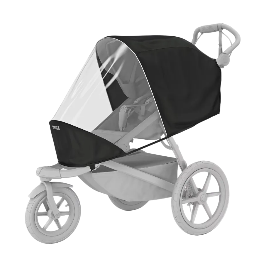 Thule Regenschutz für Kinderwagen – schwarzer Wetterschutz mit transparentem Sichtfenster auf Thule Jogging-Kinderwagen montiert