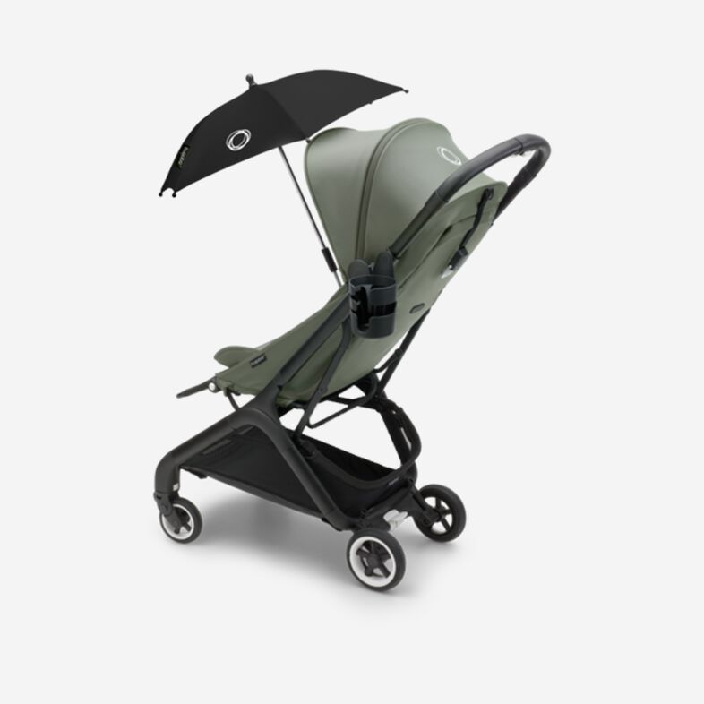 Bugaboo Kinderwagen, grün, mit Bugaboo Getränkehalter und Sonnenschirm.