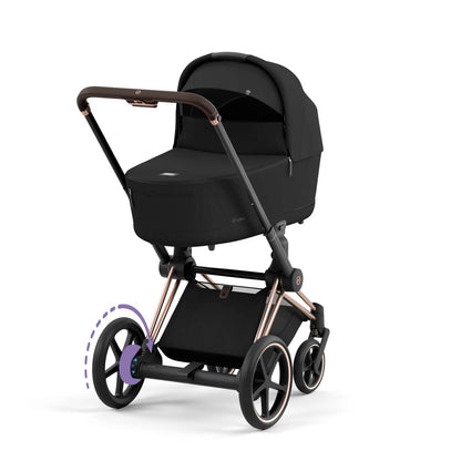 Cybex e-Priam Kinderwagen mit Babywanne und elektrischem Antriebssystem für müheloses Schieben 
Mit Rosegold Rahmen und Carry Cot in Sepia Black.