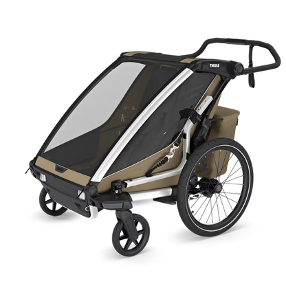 Thule Chariot Sport Kinderanhänger in Sandfarben – multifunktionaler Fahrradanhänger und Buggy mit zwei kleinen Vorderrädern und wetterfestem Verdeck